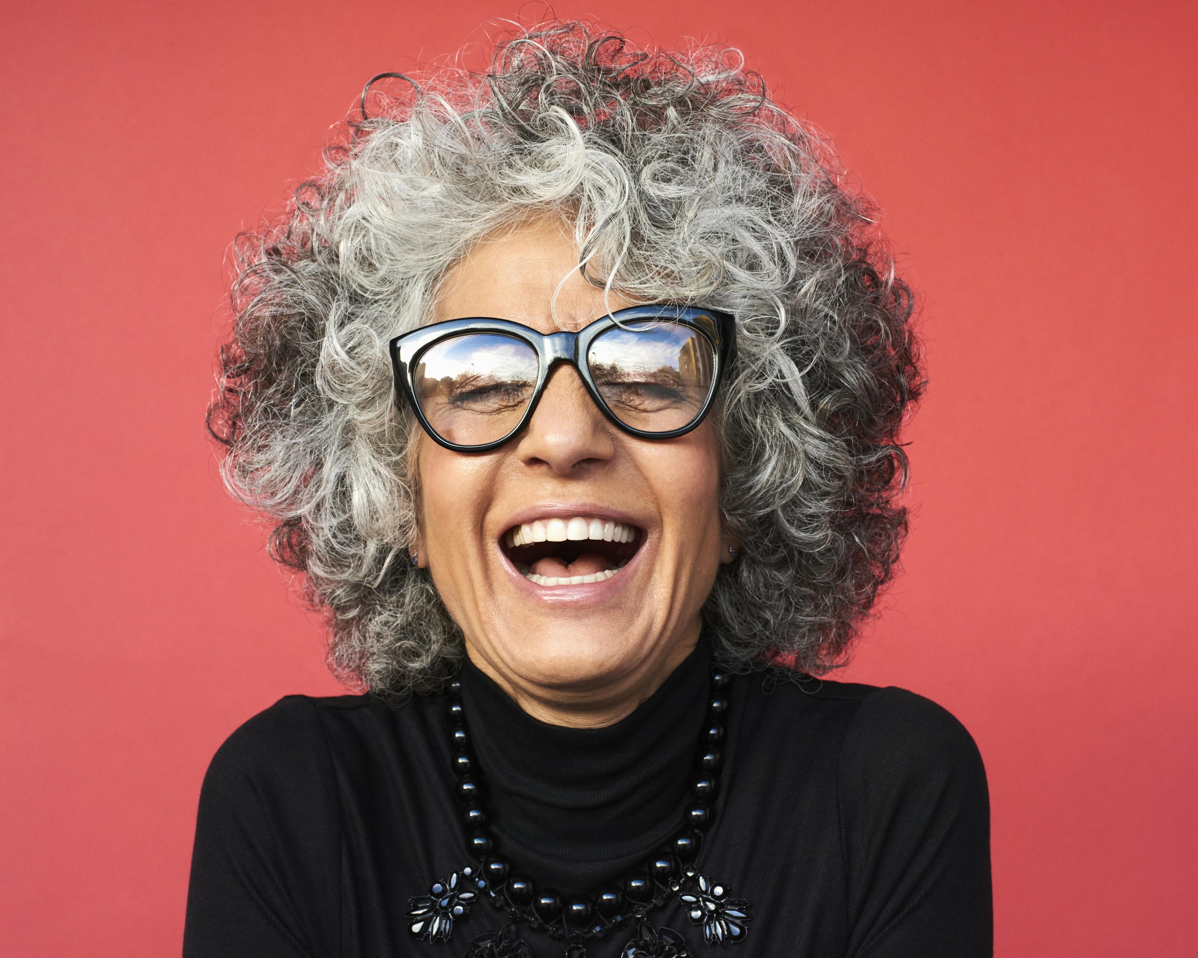 Illustrative picture for the article Three Keys for a Happy Retirement. Picture: A woman smiling.